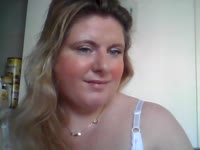 A beautiful young blonde lady with long blonde hair and green eyes who loves to receive and give pleasure