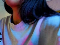 A brunette girl with soft, radiant skin, a slim body that moves with grace and energy. Her black, straight, shiny hair falls in soft waves over her shoulders, highlighting her lively face. She has a warm and contagious smile that lights up her expression and reflects her cheerful and laughing personality. Her attitude is determined and confident, always with a spark of confidence that is noticeable in her bearing and the way she interacts with others. She has a lively look that shows her enthusiasm for life, leaving an impression of freshness and positivity wherever she goes.